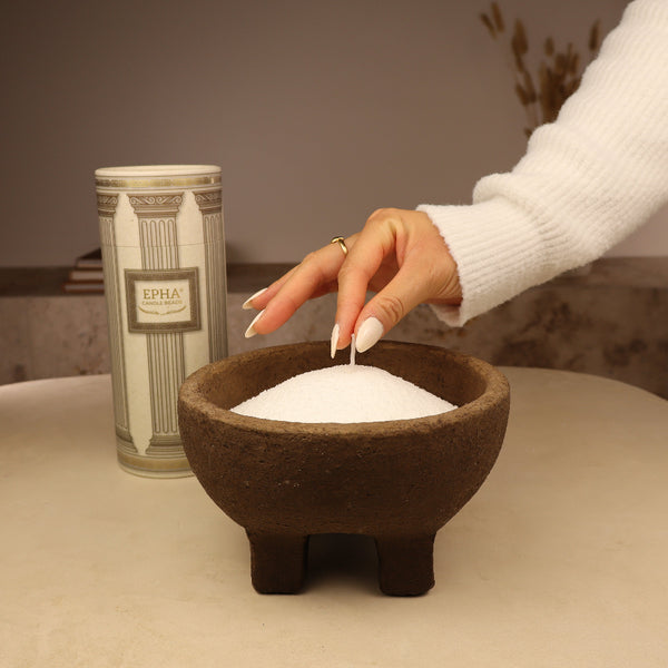 mise d’une mèche dans une bougie poudre