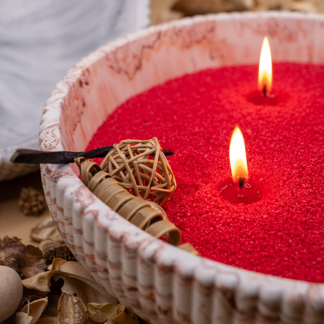bougie dans sable