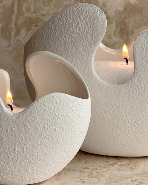 sable de bougie dans vase en ceramique